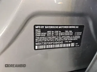 2023 BMW X1 xDrive28i with VIN WBX73EF00P5X84545, listed as a Copart auction lot 49742915 with 26,905 mi miles and Clean Title. Bid and sale history available at DreamBid. Image 12.