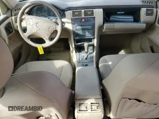 2000 Mercedes-Benz E-Class with VIN WDBJF65J7YB047628, listed as a Copart auction lot 75278704 with 0 mi miles and Salvage Title. Bid and sale history available at carsss.com. Image 8.