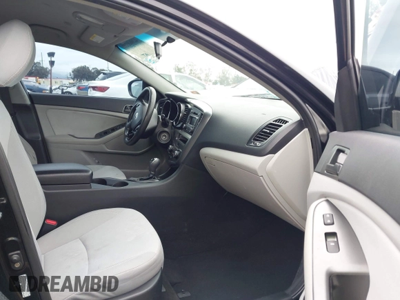2012 Kia Optima LX with VIN KNAGM4A72C5291451, listed as a IAAI auction lot 42068559 with 121,548 mi miles and . Bid and sale history available at carsss.com. Image 5.