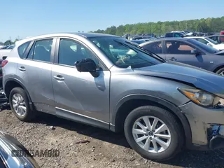 2013 Mazda CX-5 Sport z VIN JM3KE2BE9D0132928, wystawiony jako IAAI lot #41997589 z przebiegiem Nie podano mil oraz . Historia ofert i sprzedaży dostępna na DreamBid. Obrazek 12.