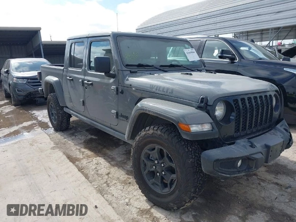 2021 Jeep Gladiator Willys с VIN 1C6HJTAG9ML559555, выставлен на аукционе IAAI как лот 41669066 с пробегом 74 799 миль миль и . История ставок и продаж доступна на DreamBid. Изображение 1.
