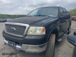 2004 Ford F-150 XLT with VIN 1FTPW14534KB78908, listed as a IAAI auction lot 41953944 with 334,411 mi miles. Bid and sale history available at carsss.com. Image 2.