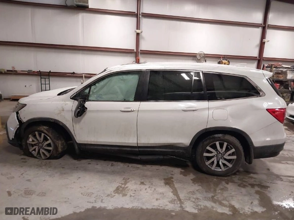 2021 Honda Pilot EX-L with VIN 5FNYF5H57MB040081, listed as a IAAI auction lot 41292215 with 72,639 mi miles. Bid and sale history available at carsss.com. Image 14.