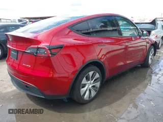 2024 Tesla Model Y Long Range with VIN 7SAYGDEE8RA283983, listed as a IAAI auction lot 39926362 with 1,999 mi miles. Bid and sale history available at carsss.com. Image 4.