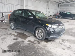 2021 Honda HR-V LX with VIN 3CZRU5H31MM710612, listed as a IAAI auction lot 41351222 with 51,802 mi miles. Bid and sale history available at carsss.com. Image 1.
