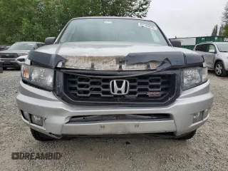 2014 Honda Ridgeline Sport with VIN 5FPYK1F7XEB011983, listed as a Copart auction lot 64146835 with 121,345 mi miles and Salvage title. Bid and sale history available at DreamBid. Image 5.