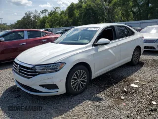 2021 Volkswagen Jetta S with VIN 3VWC57BUXMM086019, listed as a Copart auction lot 61213615 with 75,009 mi miles and Salvage title. Bid and sale history available at DreamBid. Image 1.