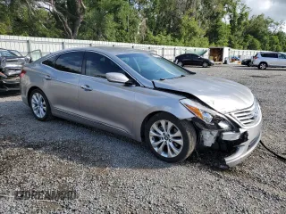 2013 Hyundai Azera z VIN KMHFG4JG3DA209396, wystawiony jako Copart lot #55789595 z przebiegiem 154 665 mil mil oraz Szkoda całkowita • Salvage title. Historia ofert i sprzedaży dostępna na DreamBid. Obrazek 4.