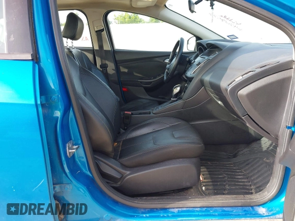 2015 Ford Focus SE with VIN 1FADP3F21FL326927, listed as a IAAI auction lot 42628577 with 112,199 mi miles and . Bid and sale history available at DreamBid. Image 5.