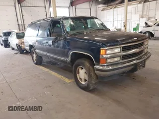 1999 Chevrolet Suburban with VIN 3GNFK16R5XG205973, listed as a IAAI auction lot 42311241 with 198,174 mi miles and . Bid and sale history available at DreamBid. Image 1.