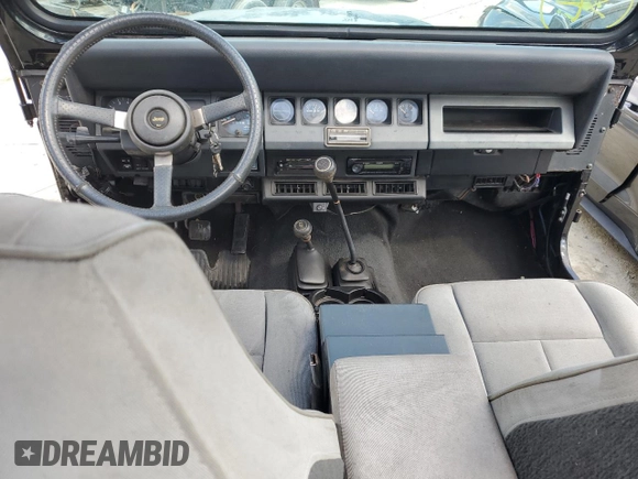 1995 Jeep Wrangler with VIN 1J4FY29SXSP230216, listed as a Copart auction lot 77257834 with 144,217 mi miles and Salvage Title. Bid and sale history available at carsss.com. Image 8.