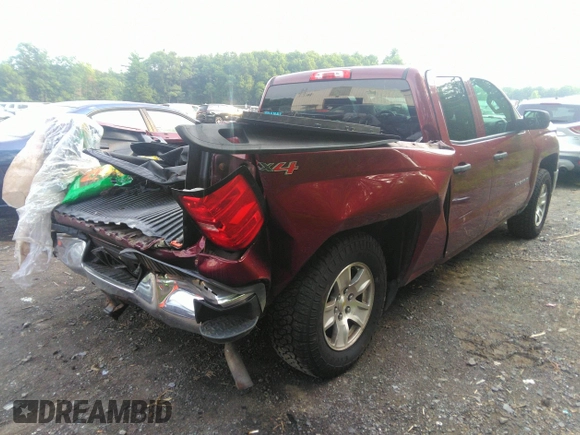 2014 Chevrolet Silverado 1500 LT with VIN 1GCVKREH7EZ166876, listed as a IAAI auction lot 39990367 with 126,326 mi miles and . Bid and sale history available at DreamBid. Image 4.