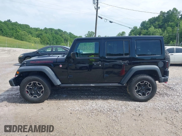 2017 Jeep Wrangler Unlimited Rubicon Recon z VIN 1C4HJWFG4HL507601, wystawiony jako IAAI lot #42258921 z przebiegiem 106 122 mil mil oraz . Historia ofert i sprzedaży dostępna na DreamBid. Obrazek 15.