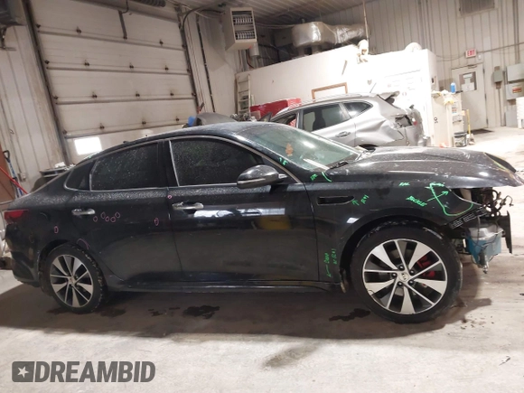 2016 Kia Optima SX Turbo with VIN 5XXGW4L27GG106780, listed as a IAAI auction lot 41586007 with 114,756 mi miles and . Bid and sale history available at carsss.com. Image 14.
