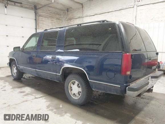 1999 Chevrolet Suburban with VIN 3GNEC16RXXG237570, listed as a IAAI auction lot 40210234 with 176,902 mi miles. Bid and sale history available at carsss.com. Image 3.