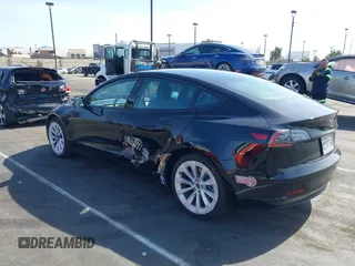 2022 Tesla Model 3 Long Range with VIN 5YJ3E1EB1NF133356, listed as a IAAI auction lot 41568303 with 73,406 mi miles and . Bid and sale history available at DreamBid. Image 13.