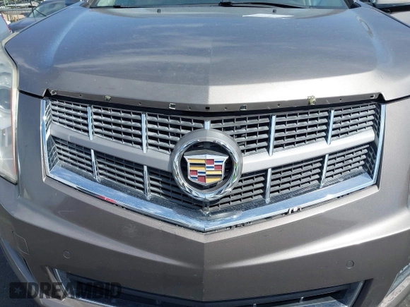 2012 Cadillac SRX Luxury Collection with VIN 3GYFNAE30CS612453, listed as a IAAI auction lot 42048235 with 173,982 mi miles and . Bid and sale history available at carsss.com. Image 14.