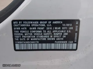 2013 Volkswagen Passat SE w/Sunroof with VIN 1VWBH7A30DC080176, listed as a IAAI auction lot 40941070 with 155,815 mi miles. Bid and sale history available at carsss.com. Image 9.