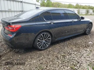 2019 BMW 7 Series 740i with VIN WBA7E2C57KB217455, listed as a Copart auction lot 69580773 with 74,717 mi miles and . Bid and sale history available at DreamBid. Image 3.