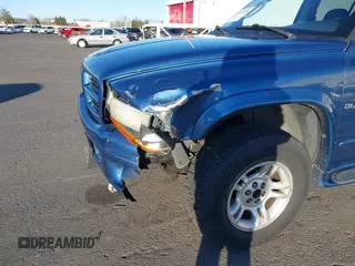2001 Dodge Durango z VIN 1B4HS28N41F631905, wystawiony jako IAAI lot #41518198 z przebiegiem 172 272 mil mil oraz . Historia ofert i sprzedaży dostępna na DreamBid. Obrazek 6.
