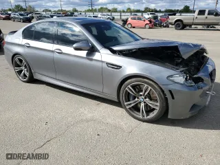 2014 BMW M5 with VIN WBSFV9C58ED097741, listed as a Copart auction lot 53825714 with 81,403 mi miles and Salvage Title. Bid and sale history available at carsss.com. Image 4.