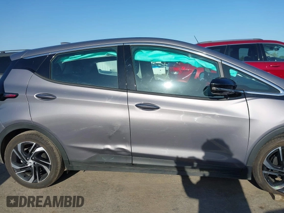 2023 Chevrolet Bolt EV 2LT with VIN 1G1FX6S05P4201698, listed as a IAAI auction lot 41999199 with 5,293 mi miles and . Bid and sale history available at DreamBid. Image 13.