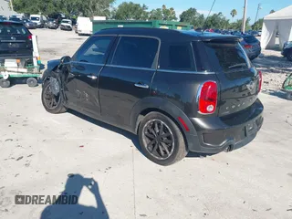 2015 MINI Countryman S with VIN WMWZC3C58FWT04316, listed as a IAAI auction lot 42525698 with 97,046 mi miles and . Bid and sale history available at DreamBid. Image 3.