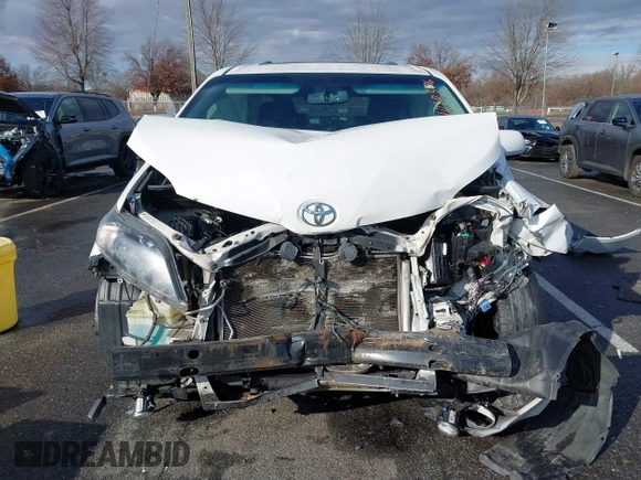 2014 Toyota Sienna SE with VIN 5TDXK3DC1ES422510, listed as a IAAI auction lot 41030376 with Not Provided miles and . Bid and sale history available at DreamBid. Image 13.