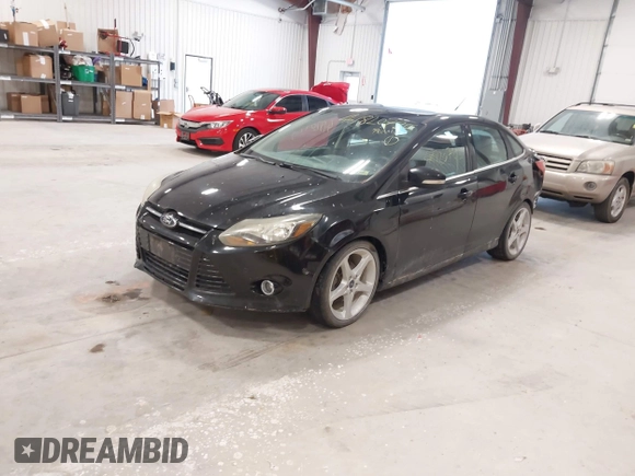 2013 Ford Focus Titanium with VIN 1FADP3J26DL221384, listed as a IAAI auction lot 41820725 with 222,380 mi miles and . Bid and sale history available at carsss.com. Image 2.