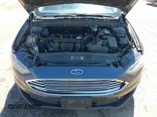 2018 Ford Fusion SE z VIN 3FA6P0H71JR155221, wystawiony jako IAAI lot #42145081 z przebiegiem 189 367 mil mil oraz . Historia ofert i sprzedaży dostępna na DreamBid. Obrazek 10.