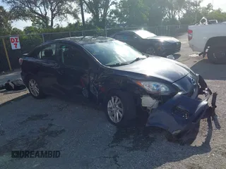 2012 Mazda 3 i Touring z VIN JM1BL1V86C1637963, wystawiony jako IAAI lot #42736538 z przebiegiem 206 071 mil mil oraz . Historia ofert i sprzedaży dostępna na DreamBid. Obrazek 1.