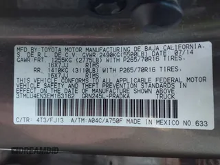 2014 Toyota Tacoma with VIN 3TMLU4EN3EM163162, listed as a IAAI auction lot 41930392 with 167,368 mi miles and . Bid and sale history available at DreamBid. Image 9.