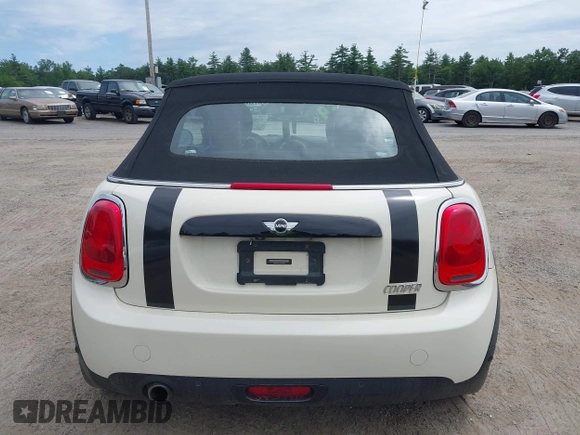 2019 MINI Convertible Cooper z VIN WMWWG5C52K3F79780, wystawiony jako IAAI lot #42622429 z przebiegiem 38 532 mil mil oraz . Historia ofert i sprzedaży dostępna na DreamBid. Obrazek 16.