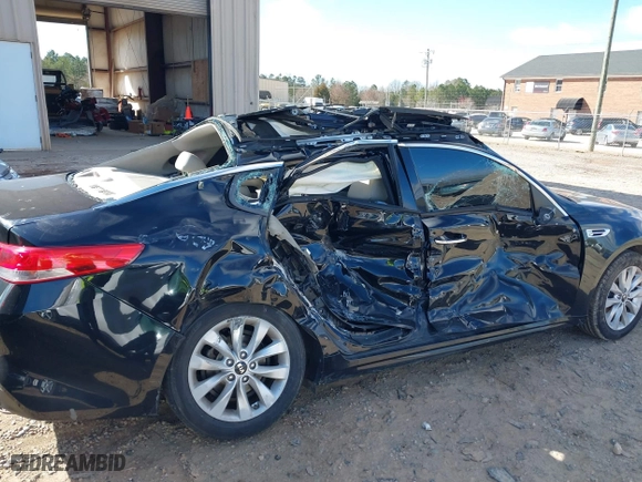 2017 Kia Optima EX with VIN 5XXGU4L33HG135421, listed as a IAAI auction lot 41738011 with 128,594 mi miles. Bid and sale history available at carsss.com. Image 6.