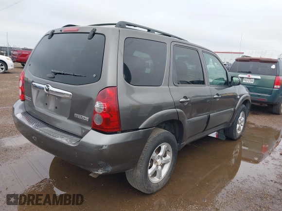 2005 Mazda Tribute S with VIN 4F2YZ04135KM05678, listed as a IAAI auction lot 42194083 with 283,488 mi miles and . Bid and sale history available at carsss.com. Image 4.