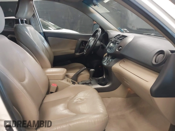 2011 Toyota RAV4 Ltd with VIN 2T3DK4DV0BW037542, listed as a IAAI auction lot 41366229 with 104,607 mi miles. Bid and sale history available at carsss.com. Image 5.