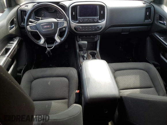 2015 GMC Canyon 2WD SLE with VIN 1GTG5BEA1F1154510, listed as a Copart auction lot 69799544 with 25,868 mi miles and Salvage Title. Bid and sale history available at carsss.com. Image 8.