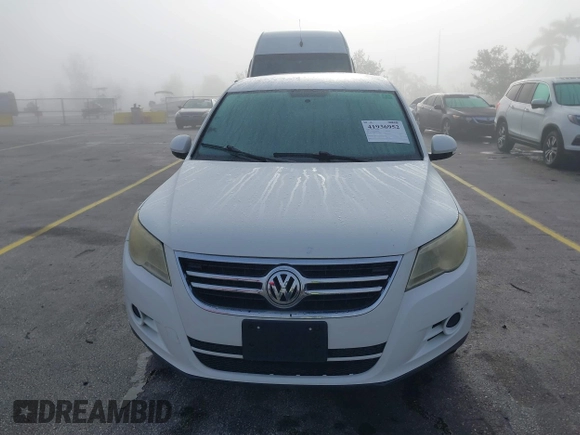 2010 Volkswagen Tiguan SEL with VIN WVGBV7AX6AW521541, listed as a IAAI auction lot 41936952 with 124,499 mi miles and . Bid and sale history available at DreamBid. Image 6.