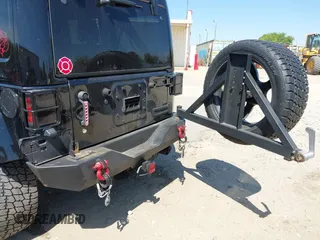2014 Jeep Wrangler Unlimited Sahara with VIN 1C4BJWEG1EL258242, listed as a IAAI auction lot 41894966 with 90,234 mi miles. Bid and sale history available at carsss.com. Image 18.