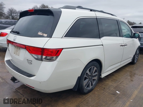 2016 Honda Odyssey Touring Elite with VIN 5FNRL5H9XGB100116, listed as a IAAI auction lot 41543464 with 160,763 mi miles and . Bid and sale history available at DreamBid. Image 4.