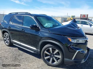 2023 Honda Pilot Elite with VIN 5FNYG1H80PB007959, listed as a IAAI auction lot 41677282 with 28,892 mi miles. Bid and sale history available at carsss.com. Image 1.