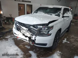 2015 Chevrolet Tahoe Commercial with VIN 1GNSK2EC8FR722684, listed as a IAAI auction lot 41553558 with 119,434 mi miles. Bid and sale history available at carsss.com. Image 17.