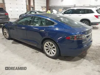 2018 Tesla Model S 75D with VIN 5YJSA1E24JF257817, listed as a IAAI auction lot 41960439 with 61,971 mi miles and . Bid and sale history available at DreamBid. Image 3.