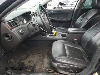2012 Chevrolet Impala LTZ with VIN 2G1WC5E35C1317341, listed as a Copart auction lot 43404685 with 131,702 mi miles and Salvage Title. Bid and sale history available at DreamBid. Image 7.