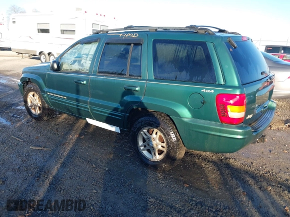 1999 Jeep Grand Cherokee Limited with VIN 1J4GW68S1XC555399, listed as a IAAI auction lot 41764099 with 1 mi miles. Bid and sale history available at carsss.com. Image 3.