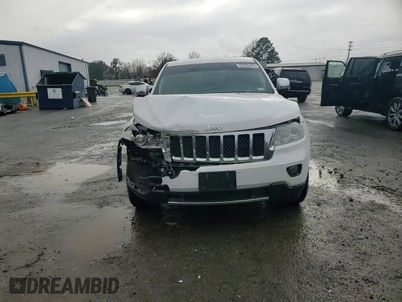 2013 Jeep Grand Cherokee Overland with VIN 1C4RJECT2DC590911, listed as a Copart auction lot 42939405 with 136,673 mi miles and Salvage Title. Bid and sale history available at carsss.com. Image 11.