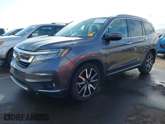 2019 Honda Pilot Touring 7-Passenger z VIN 5FNYF5H65KB020420, wystawiony jako IAAI lot #41575972 z przebiegiem 48 950 mil mil oraz . Historia ofert i sprzedaży dostępna na DreamBid. Obrazek 17.