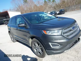 2015 Ford Edge Titanium z VIN 2FMTK3K90FBB13499, wystawiony jako IAAI lot #41492084 z przebiegiem 256 649 mil mil oraz . Historia ofert i sprzedaży dostępna na DreamBid. Obrazek 13.