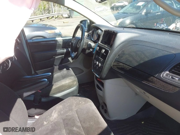 2015 Dodge Grand Caravan SXT Premium Plus with VIN 2C4RDGBG0FR570545, listed as a IAAI auction lot 41866803 with 217,259 mi miles. Bid and sale history available at carsss.com. Image 5.