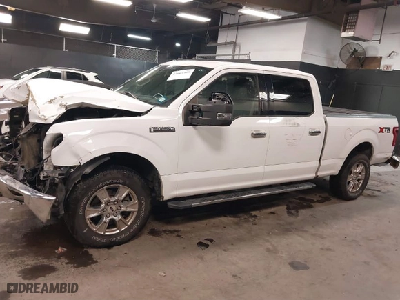 2015 Ford F-150 XLT w/HD Payload Pkg with VIN 1FTFW1EF8FKF09732, listed as a IAAI auction lot 41064468 with 105,340 mi miles. Bid and sale history available at carsss.com. Image 14.